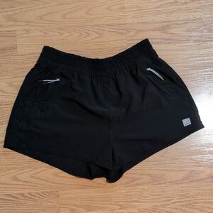 Vuori Women's Black Athletic Shorts with Zipper Pockets